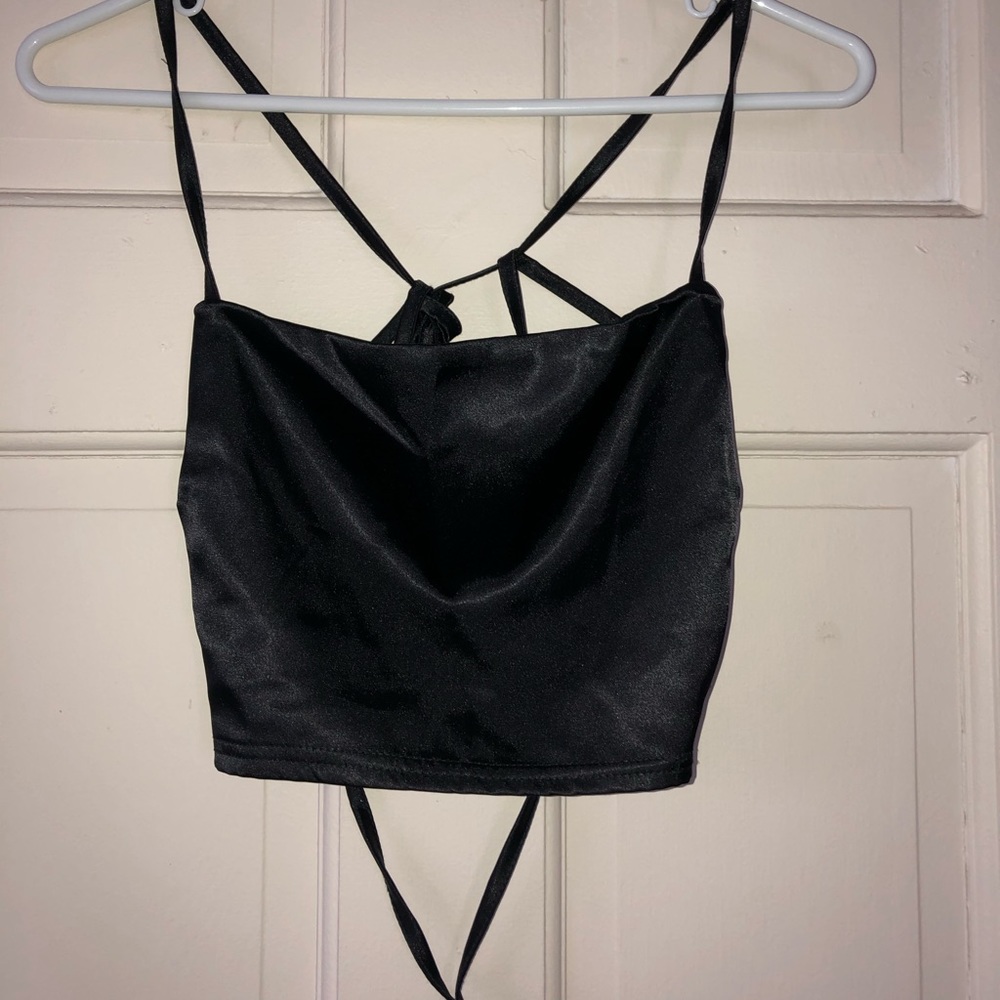 Satin crop top with ties in the back. NEVER WORN.